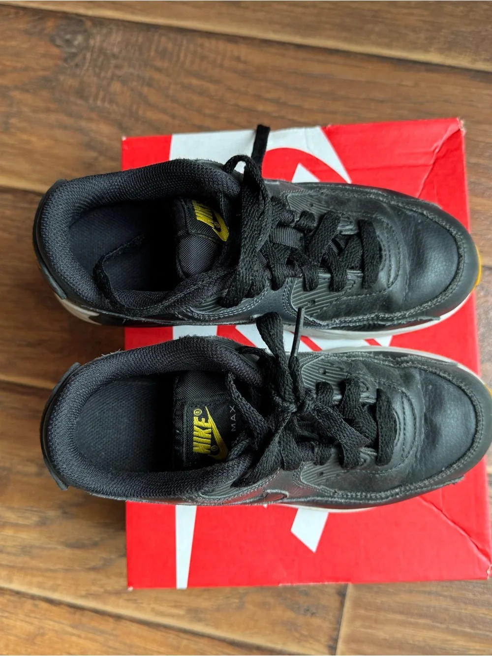 Nike Black Sneakers with Yellow Accents